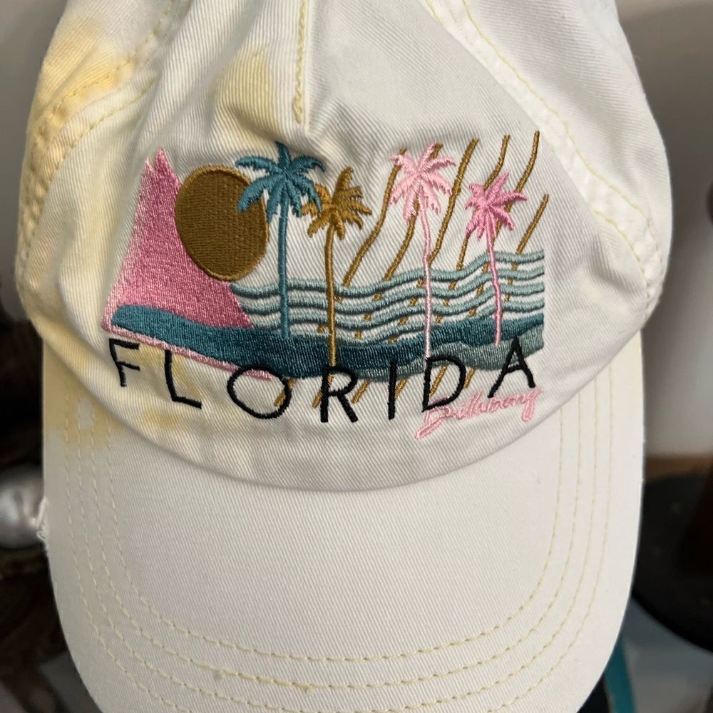 Women’s distressed Billabong embroidered Florida adjustable hat.